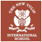 The New Tulip International School logo